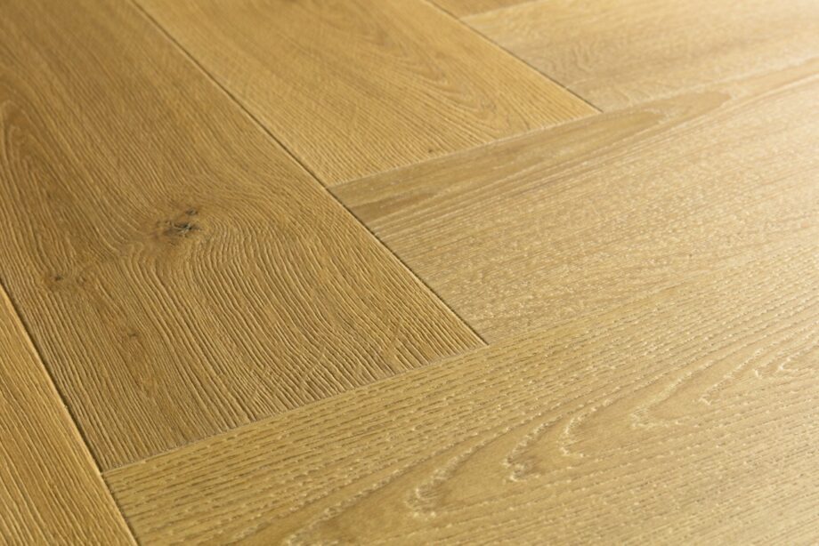 Laminat Fischgrät Quick Step Impressive Suunnittelu Cumin Oak, warme natürliche Eichenfarbe und harmonische Sortierung