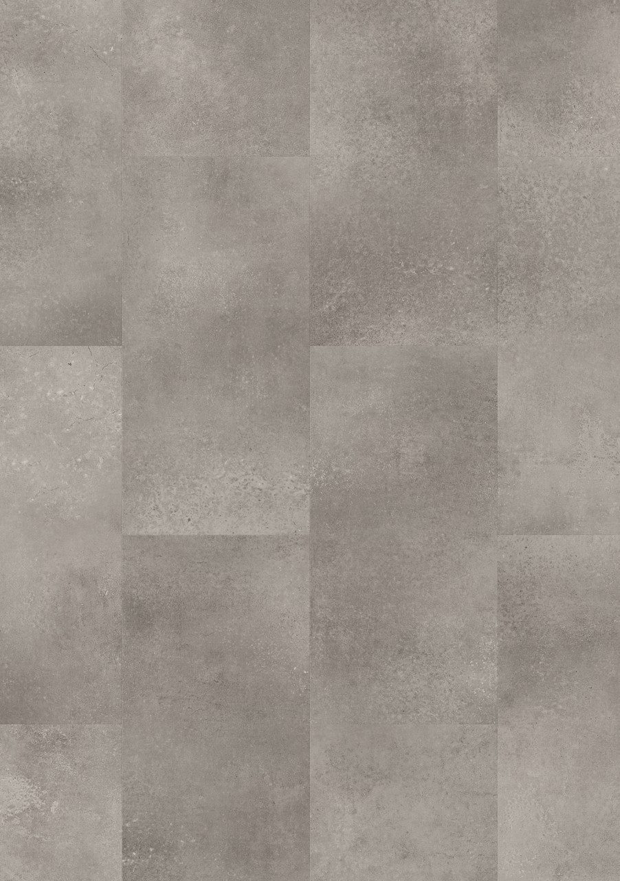 Vinyylilaatta Quick-Step Oro Concrete Rock asennettuna modernin kodin lattialle – vaaleanharmaa betonisävy ja selkeä, teollishenkinen betonikividesign.
